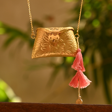 Sunehri Pitara Ginni Bag with Pink Tassel