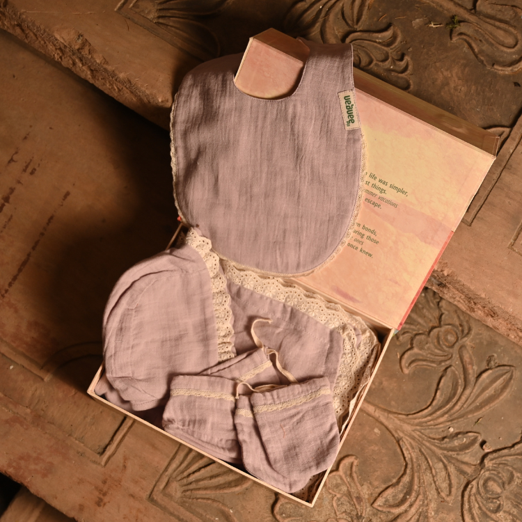 Newborn Essentials Gift Set – Lavender (Swaddle, Bib, Booties & Mittens)